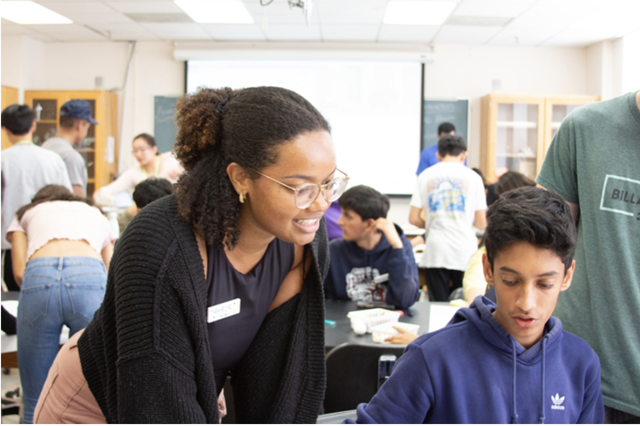 An instructor working with a student